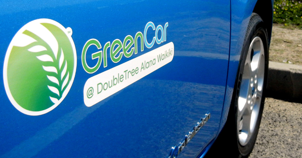 This image has an empty alt attribute; its file name is greencar-hawaii.jpg