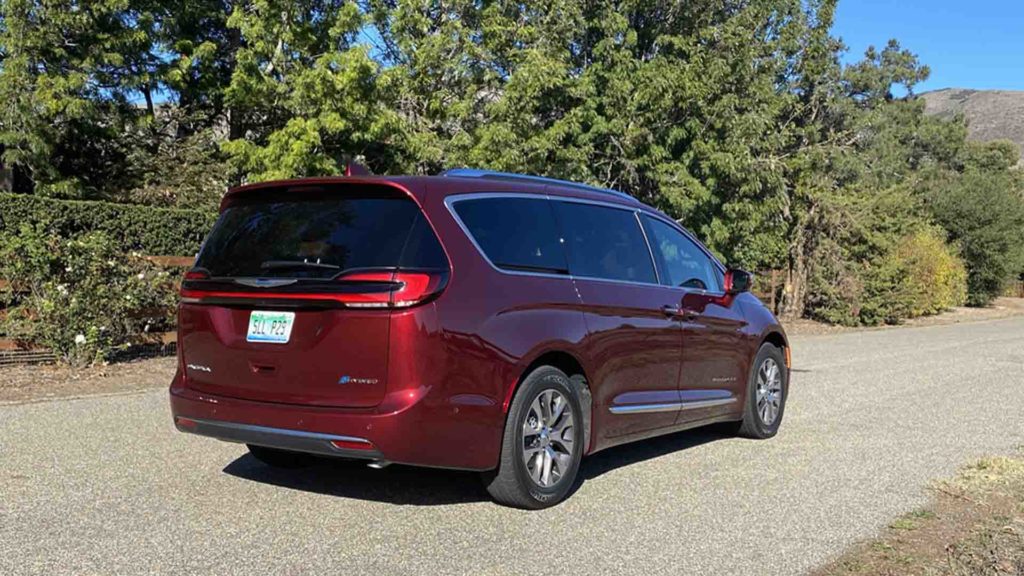 Chrysler Pacifica Hybrid minivan driving.